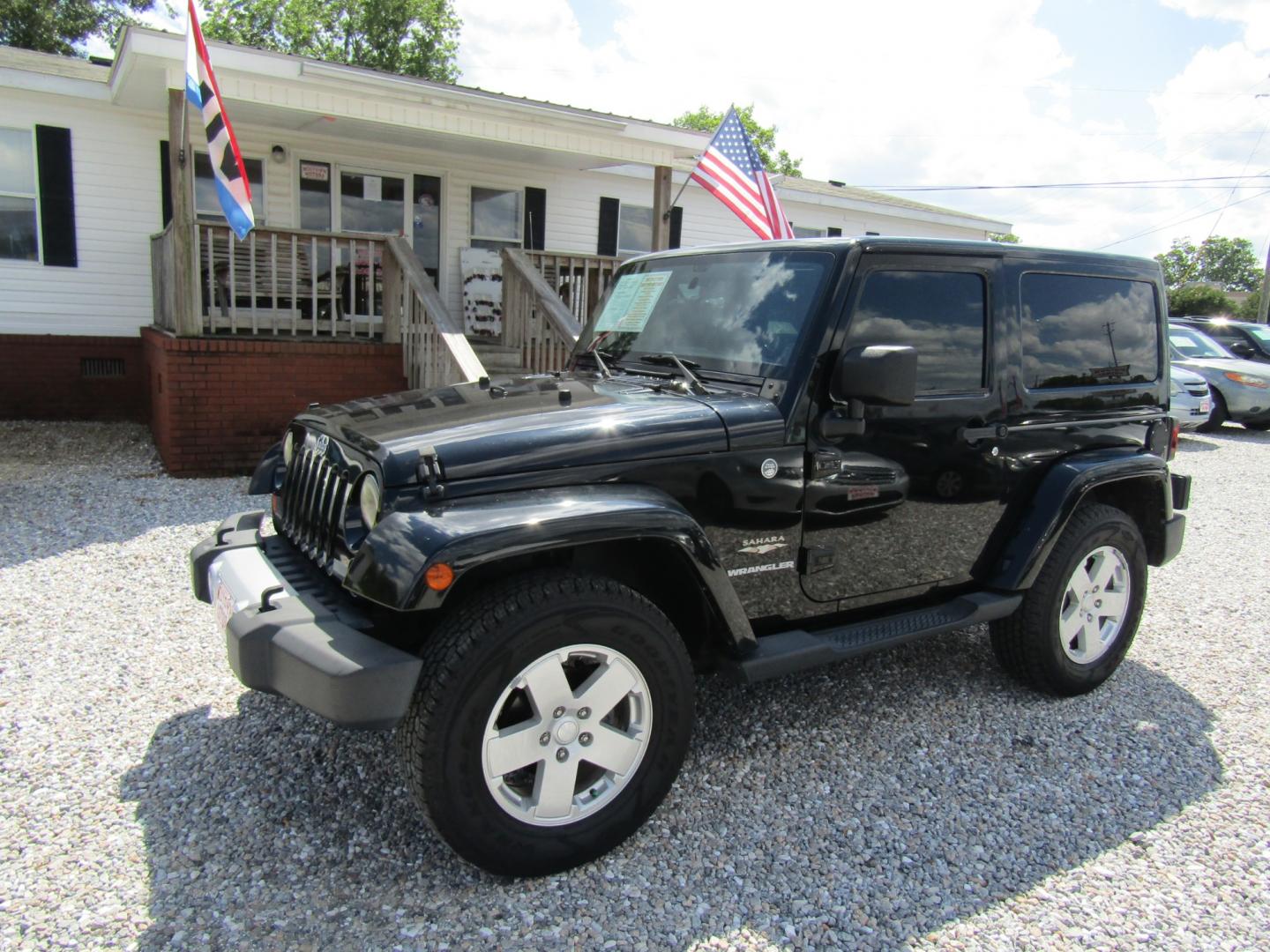 2012 Black /Tan Jeep Wrangler Sahara 4WD (1C4GJWBG2CL) with an 3.6L V6 DOHC 24V FFV engine, Automatic transmission, located at 15016 S Hwy 231, Midland City, AL, 36350, (334) 983-3001, 31.306210, -85.495277 - Photo#2